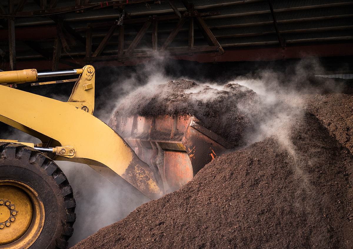 Truck lifting soil