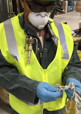 Chest of a person wearing PPE