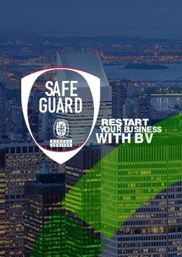 Arial view of NYC at night with part of a colorful semi-circle overlay