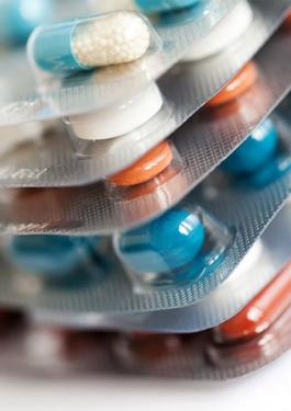 Pills in aluminum and plastic packaging in a stack