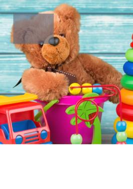 different classical toys (teddy bear, truck, etc.) along a blue background