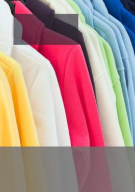 several, different colored fleece jackets hanging up