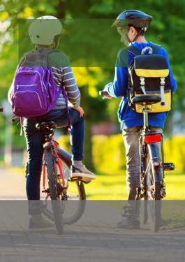 two children riding bikes