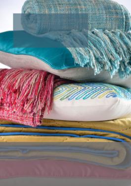 stack of pillows and blankets
