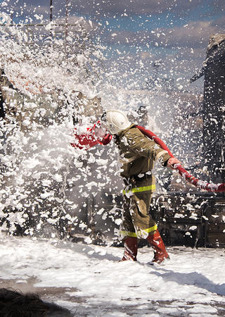 Firefighters using firefighting foam with PFAS