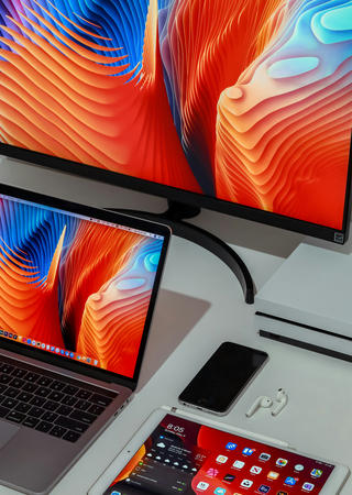 wireless electronics including desktop computer, laptop, tablet, phone, earbuds